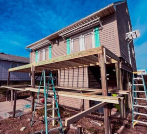 Elevated deck construction underway in Oak Island, NC — built strong for coastal conditions by RGR Construction & Roofing