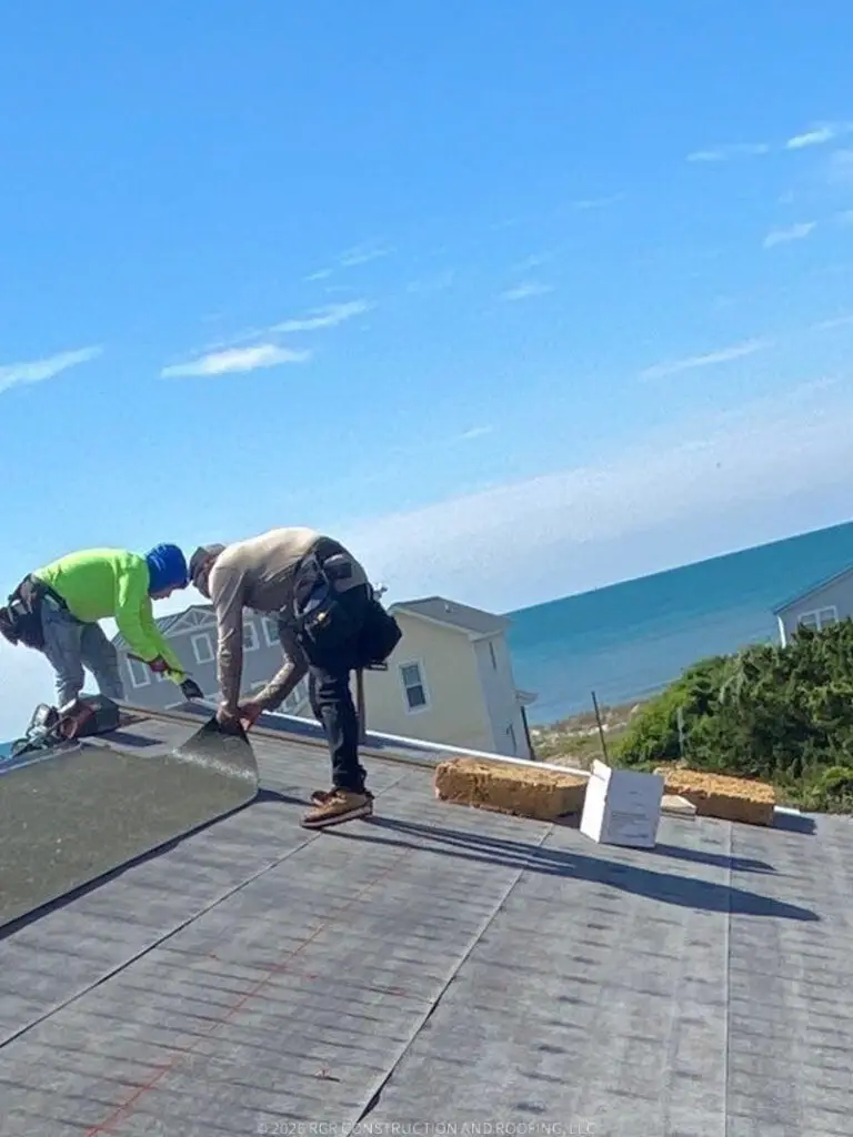 Starter strip installation on fortified coastal roof replacement in Oak Island NC by RGR Construction and Roofing with oceanfront roofing crew.