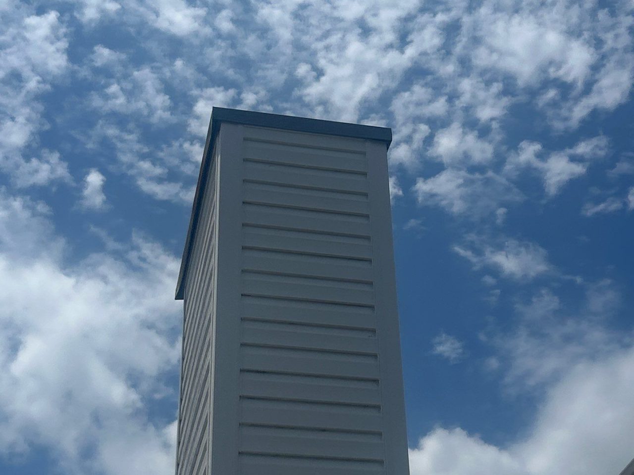 Chimney Leak Repair and Metal Cap Replacement in Wilmington NC by RGR Construction and Roofing, LLC