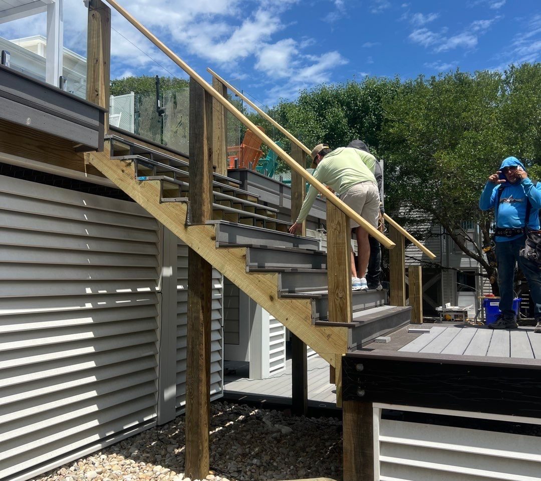 Deck Staircase Repair using Trex Composite Decking in Oak Island, NC by Licenesed General Contractor by RGR Construction and Roofing, LLC