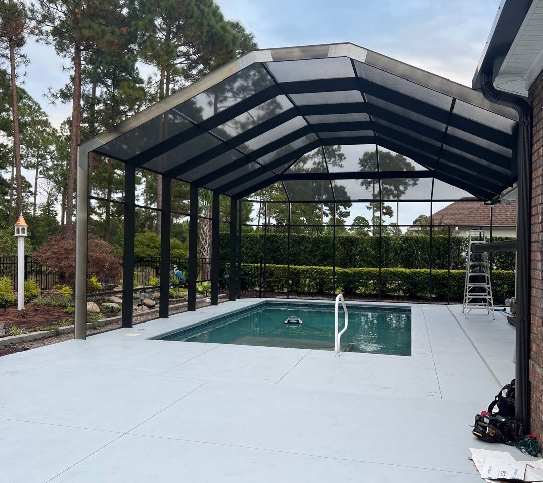 Pool Enclosure and Outdoor Living Space Storm Damage Repair by RGR Construction and Roofing, LLC