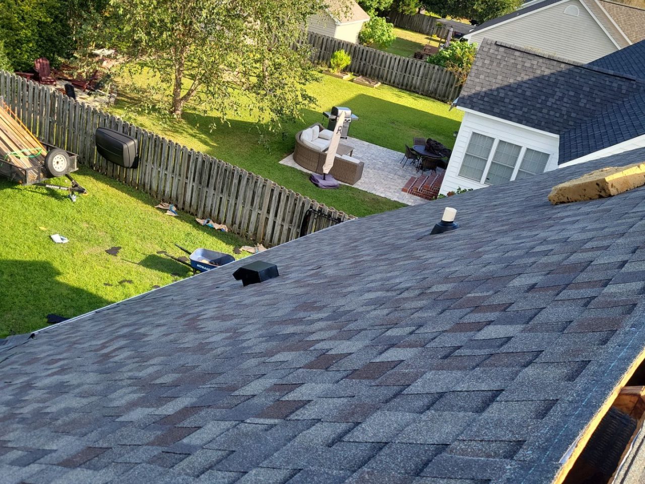 Storm Damage Repair using Black Galvanized steel Square Roof Louver by RGR Construction and Roofing, LLC