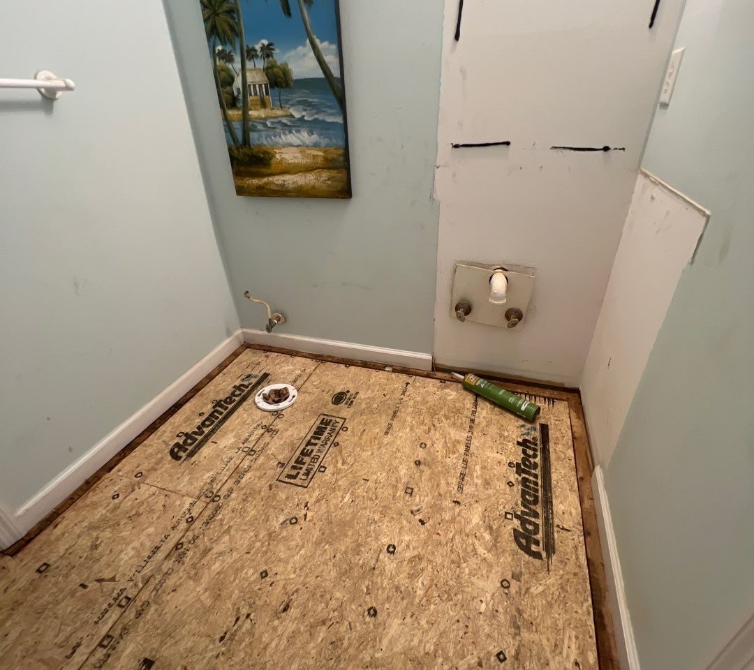 Caving Floor Flooring Installation in Oak Island, NC by RGR Construction and Roofing, LLC