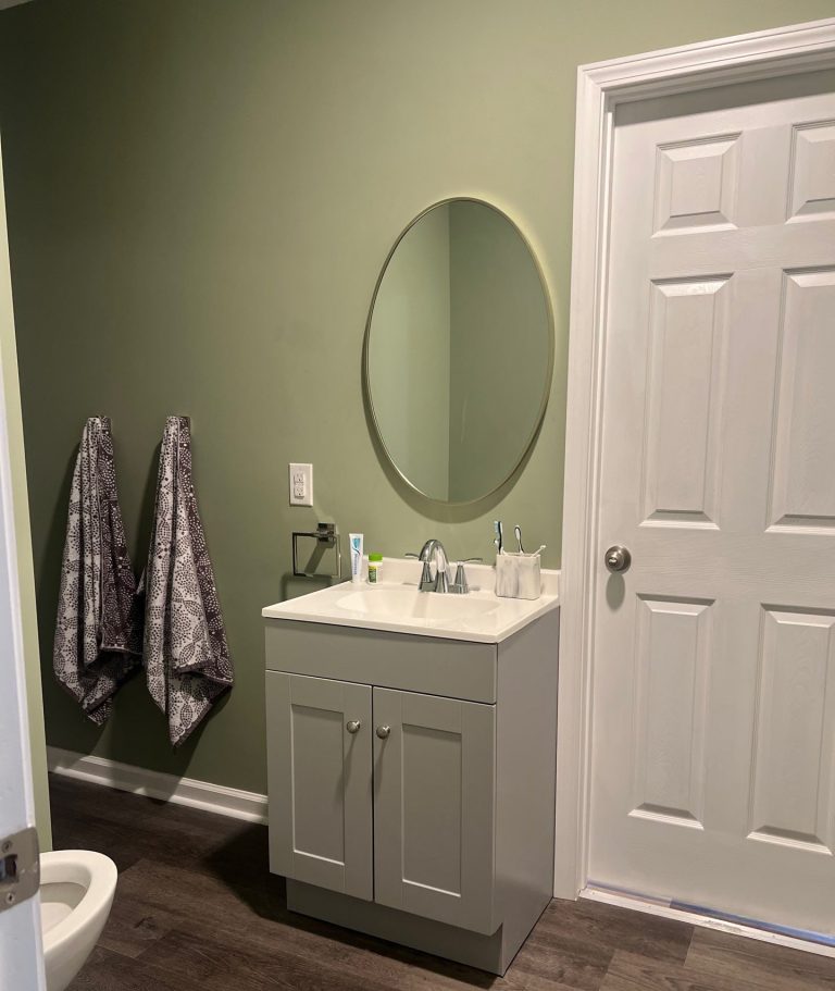 Bathroom vanity and painted walls in the Belville home