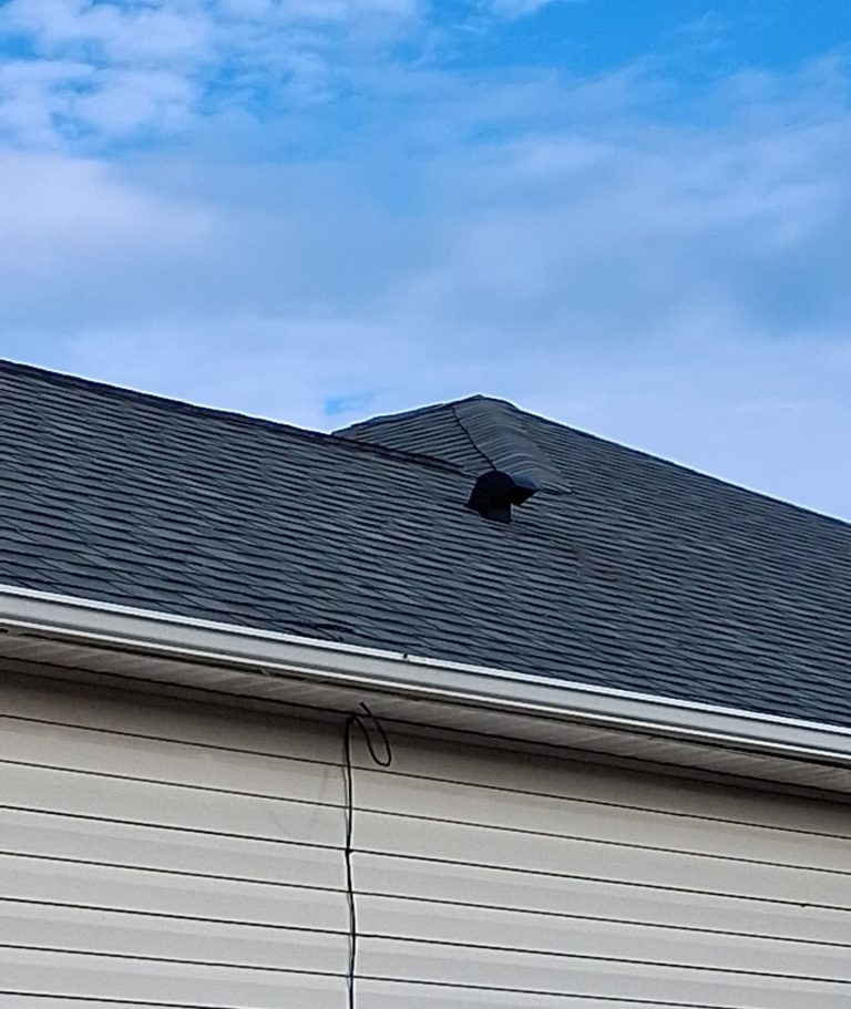 Close view of the black roof louver above the rear gutter in Leland NC