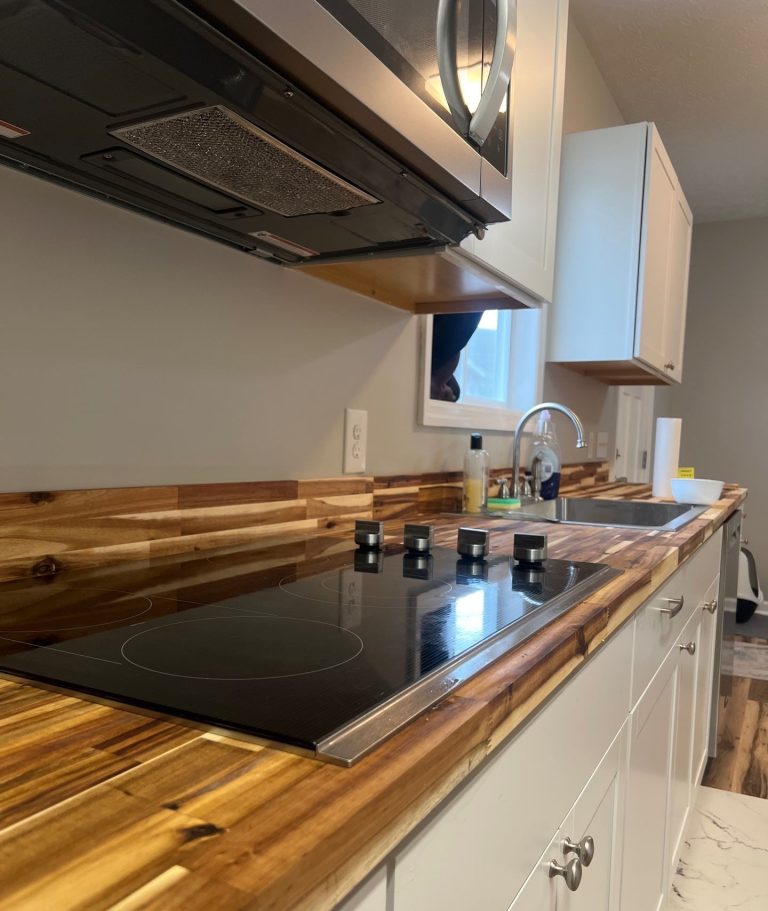 Close view of updated kitchen countertops and cabinetry in Belville