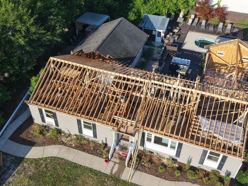 New wood roof rafters over a fire-damaged Wilmington home during reconstruction
