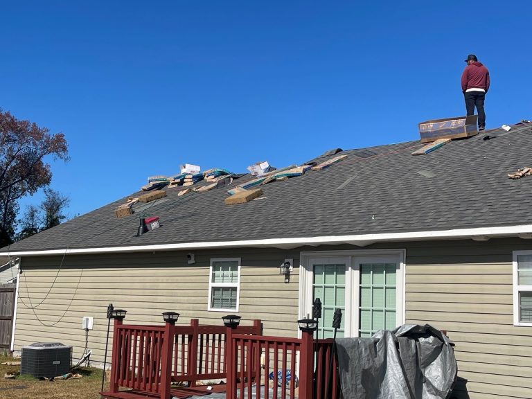 Shingle installation underway on the rear roof in Sneads Ferry