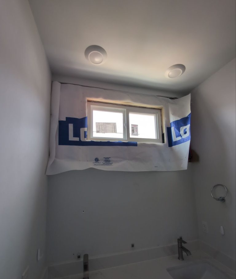 New bathroom window above the tub area in the Wilmington home