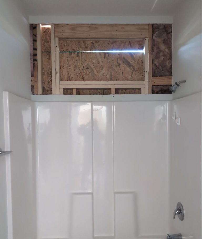 Interior framing above the bathroom tub surround