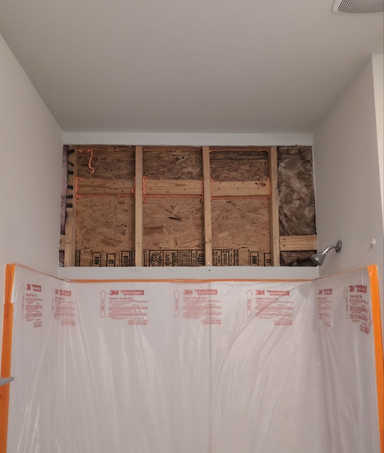 Opened interior wall above the protected bathroom fixtures