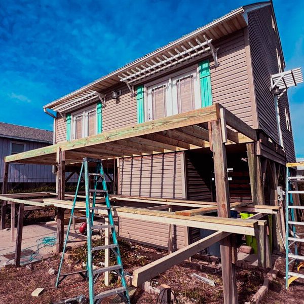 Elevated deck construction underway in Oak Island, NC — built strong for coastal conditions by RGR Construction & Roofing